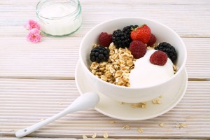 Combine 2 % greek yogurt, 1/2 cup of fruit and sprinkle of granola for an awesome pre-game snack!